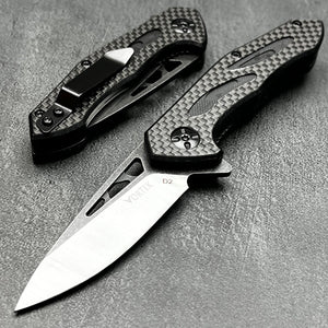 CINDER:  Carbon Fiber Handles,  D2 Drop Point Blade,  Ball Bearing Flipper System