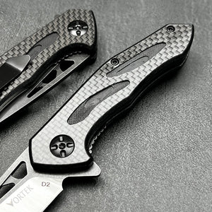 CINDER:  Carbon Fiber Handles,  D2 Drop Point Blade,  Ball Bearing Flipper System