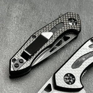 CINDER:  Carbon Fiber Handles,  D2 Drop Point Blade,  Ball Bearing Flipper System