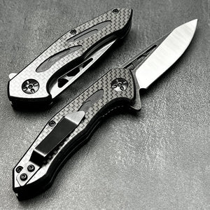 CINDER:  Carbon Fiber Handles,  D2 Drop Point Blade,  Ball Bearing Flipper System