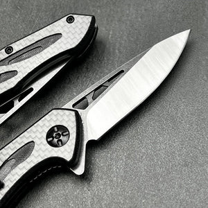 CINDER:  Carbon Fiber Handles,  D2 Drop Point Blade,  Ball Bearing Flipper System