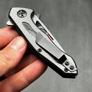 CINDER:  Carbon Fiber Handles,  D2 Drop Point Blade,  Ball Bearing Flipper System