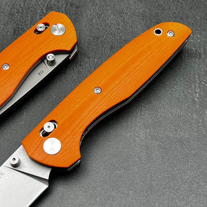 FOCAL: Orange G10 Handles, D2 Drop Point Blade, Axis lock Safety System, EDC Large Folding Pocket Knife