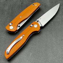 Load image into Gallery viewer, FOCAL: Orange G10 Handles, D2 Drop Point Blade, Axis lock Safety System, EDC Large Folding Pocket Knife