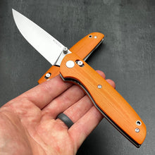 Load image into Gallery viewer, FOCAL: Orange G10 Handles, D2 Drop Point Blade, Axis lock Safety System, EDC Large Folding Pocket Knife