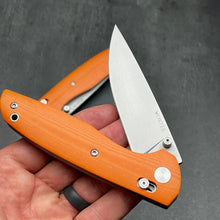 Load image into Gallery viewer, FOCAL: Orange G10 Handles, D2 Drop Point Blade, Axis lock Safety System, EDC Large Folding Pocket Knife