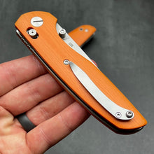 Load image into Gallery viewer, FOCAL: Orange G10 Handles, D2 Drop Point Blade, Axis lock Safety System, EDC Large Folding Pocket Knife