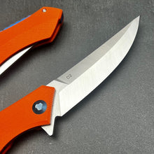 Load image into Gallery viewer, SCIMITAR:  Orange G10 Handles, D2 Trailing Point Blade,  Ball Bearing Flipper System, EDC Folding Pocket Knife