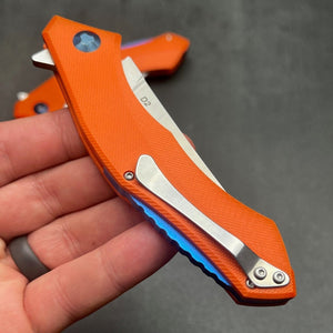 SCIMITAR:  Orange G10 Handles, D2 Trailing Point Blade,  Ball Bearing Flipper System, EDC Folding Pocket Knife