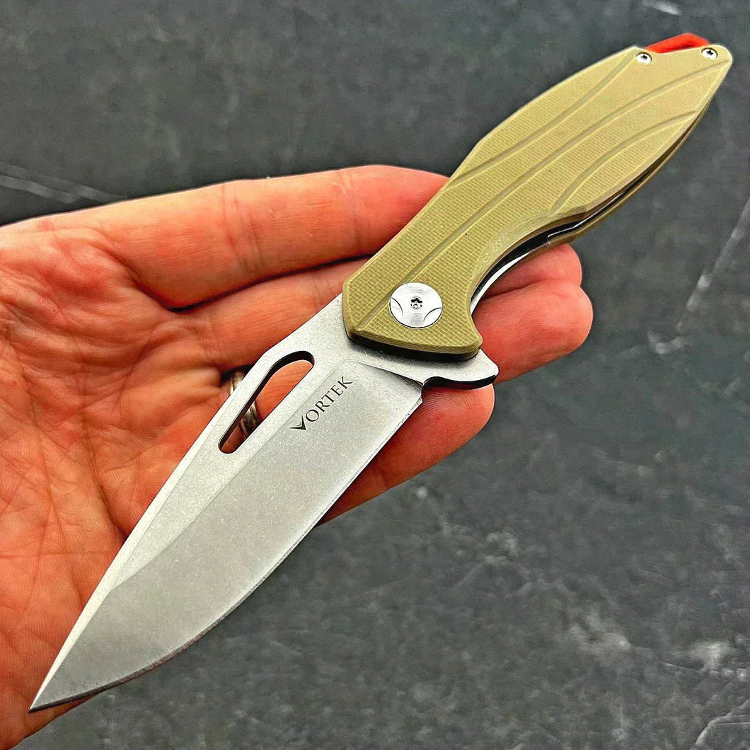 PELICAN: Tan G10 Handles, D2 Drop Point Blade,  Ball Bearing Flipper System