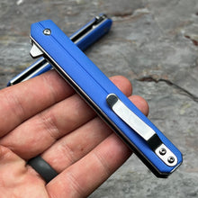 Load image into Gallery viewer, SKYLINE: Blue G10 Handles, Slim Executive Design, D2 Tanto Blade, Fast Opening Ball Bearing Flipper Blade, EDC Folding Pocket Knife