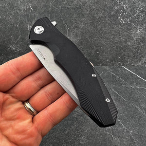 BRIGADE: Large D2 Drop Point Blade, Black G10 Handles,  Fast Open Ball Bearing Pivot System