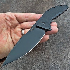 GROWLER: Black Oxide D2 Drop Point Blade, Black G10 Handles, Ball Bearing Flipper System