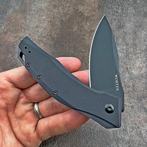 GROWLER: Black Oxide D2 Drop Point Blade, Black G10 Handles, Ball Bearing Flipper System