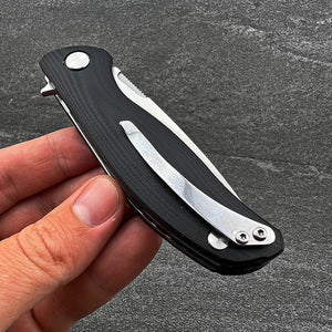 TURRET:  Black G10 Handles, D2 Drop Point Blade,  Ball Bearing Flipper System