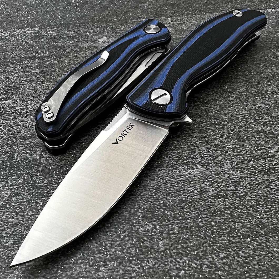 TURRET: Black and Blue G10 Handles, D2 Drop Point Blade,  Ball Bearing Flipper Sytem