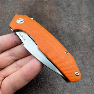 MUSKRAT:  Orange G10 Handles, 9Cr18MoV Drop Point Blade,  Ball Bearing Flipper System