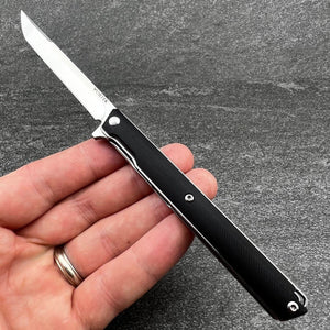 HANCOCK: Slim Design Executive Knife, Black G10 Handles, D2 Tanto Blade.  Ball Bearing Flipper System