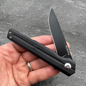 NOVA: Tactical Black G10 Handle, D2 Slim Design Black Blade,  Ball Bearing Flipper System