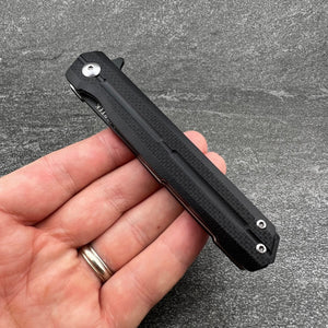 NOVA: Tactical Black G10 Handle, D2 Slim Design Black Blade,  Ball Bearing Flipper System