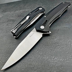 SCURRY:  D2 Drop Point Blade, Black G10 Handles,  Ball Bearing Flipper Pivot System