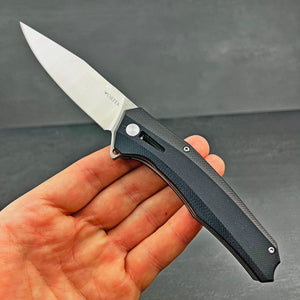 SCURRY:  D2 Drop Point Blade, Black G10 Handles,  Ball Bearing Flipper Pivot System