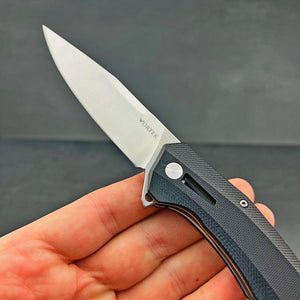 SCURRY:  D2 Drop Point Blade, Black G10 Handles,  Ball Bearing Flipper Pivot System