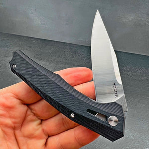 SCURRY:  D2 Drop Point Blade, Black G10 Handles,  Ball Bearing Flipper Pivot System