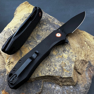 FOXTROT:  Black G10 Handles, D2 Drop Point Blade,  Ball Bearing Pivot System