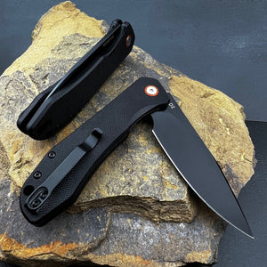 FOXTROT:  Black G10 Handles, D2 Drop Point Blade,  Ball Bearing Pivot System