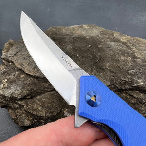 SCIMITAR: Blue G10 Handles, D2 Trailing Point Blade, Ball Bearing Flipper System