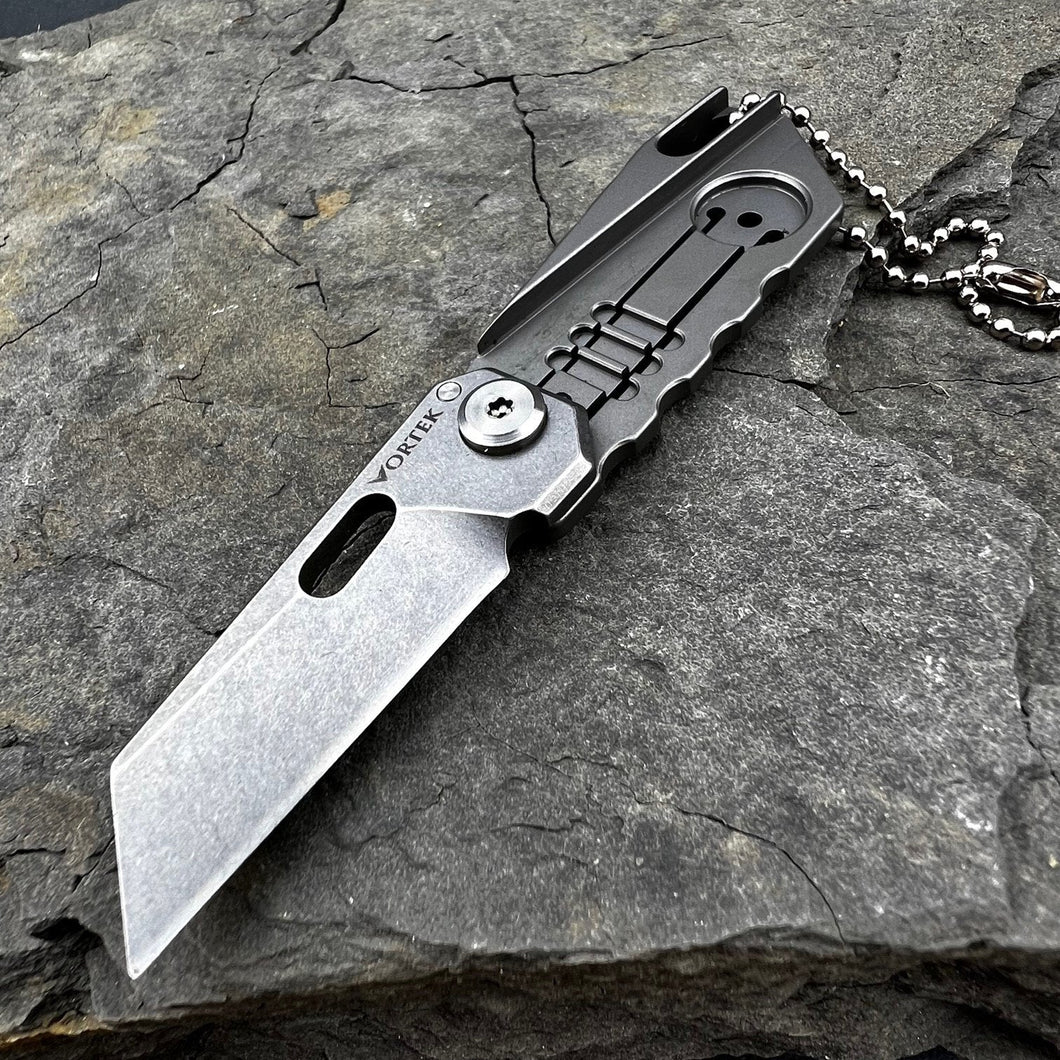 MUSCA: Small Keychain Pocket Knife, D2 Sheepsfoot Blade, Grey Titanium Handles