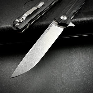 NOVA:  Tactical Black G10 Handles, Ball Bearing Flipper System, D2 Straight Back Blade