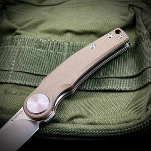 OMEGA: Desert Tan G10 Handles, D2 Wharncliffe Blade, Ball Bearing Flipper System