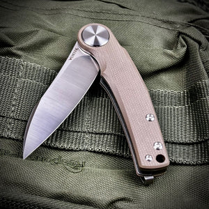 OMEGA: Desert Tan G10 Handles, D2 Wharncliffe Blade, Ball Bearing Flipper System