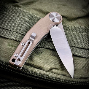 OMEGA: Desert Tan G10 Handles, D2 Wharncliffe Blade, Ball Bearing Flipper System