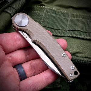 OMEGA: Desert Tan G10 Handles, D2 Wharncliffe Blade, Ball Bearing Flipper System