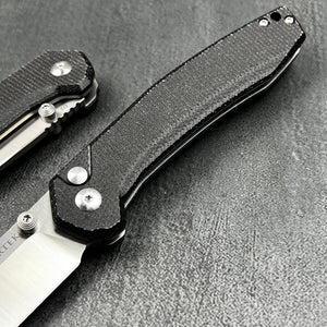 BALDUR: Black Micarta Handles, D2 Tanto Blade, Button Safety Lock, Ball Bearing Pivot System