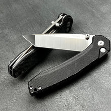 Load image into Gallery viewer, BALDUR: Black Micarta Handles, D2 Tanto Blade, Button Safety Lock, Ball Bearing Pivot System