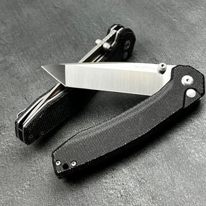 BALDUR: Black Micarta Handles, D2 Tanto Blade, Button Safety Lock, Ball Bearing Pivot System