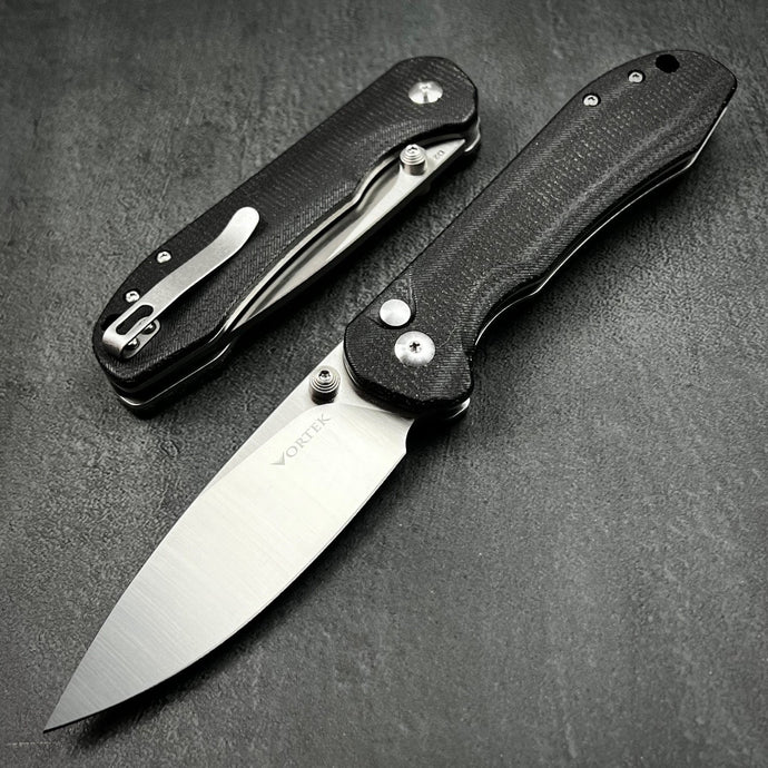 BORIS: Black Micarta Handles, Button Safety Lock, Ball Bearing Pivot System, D2 Drop Point Blade