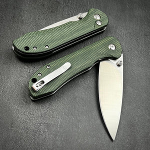 BORIS: Green Micarta Handles, D2 Drop Point Blade, Button Safety Lock, Ball Bearing Pivot System