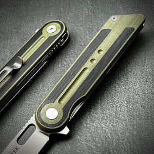 ASTRID: Sandvik 14C28N Tanto Blade, Black and Green G10 Handles, Ball Bearing Pivot System, Deep Carry Pocket Clip