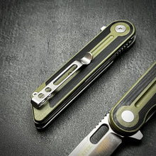 Load image into Gallery viewer, ASTRID: Sandvik 14C28N Tanto Blade, Black and Green G10 Handles, Ball Bearing Pivot System, Deep Carry Pocket Clip