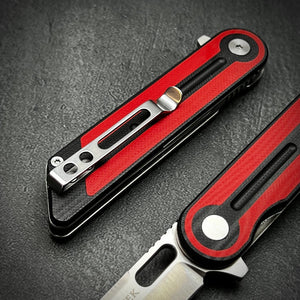 ASTRID: Sandvick 14C28N Tanto Blade, Red and Black G10 Handles, Ball Bearing Pivot System, Deep Carry Pocket Clip