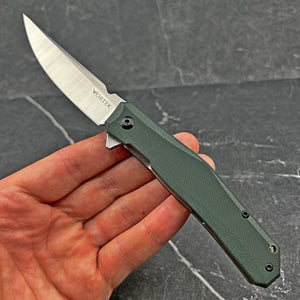 NIMBUS: Green G10 Handles, Ball Bearing Flipper Pivot System, D2 Trailing Point Blade