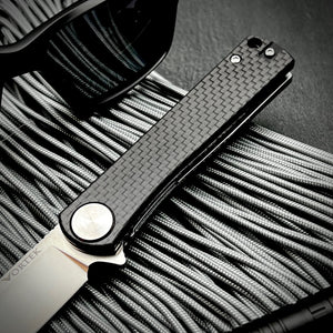 OSKAR:  Carbon Fiber Handles,  D2 Tool Steel Blade,  Ball Bearing Pivot System,  EDC Folding Pocket Knife