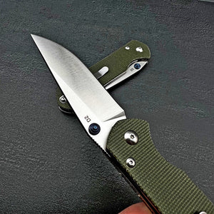 OTIS: Green Micarta Handles, Thumb Stud Opening, D2 Tool Steel Blade