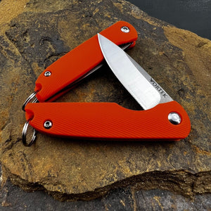 PIKA: Small Keychain Knife, D2 Ball Bearing Flipper Blade, Orange Composite Handles